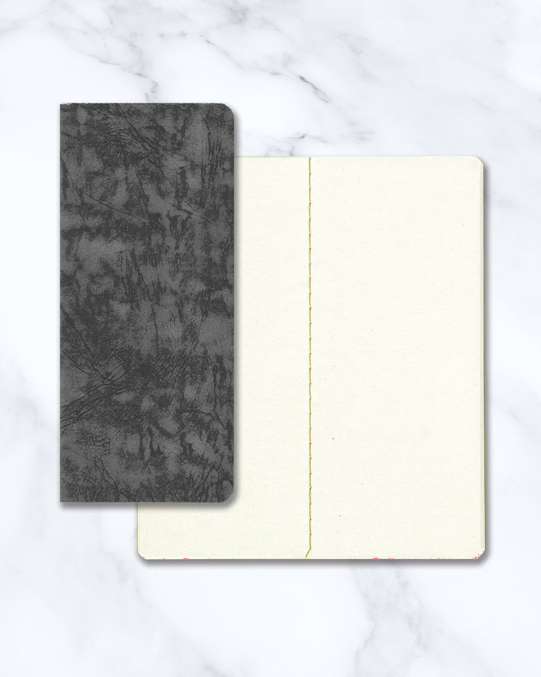 Ro-biki in Japanese means 'waxed'. Their refill notebooks will take on their own patina over time, and this is part of their charm.