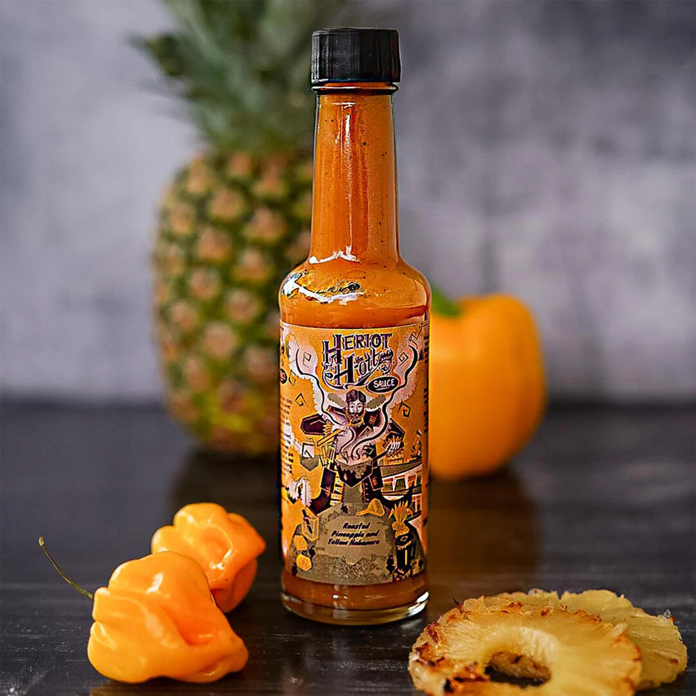 Crafted with a unique blend of roasted pineapple, sweet yellow peppers, and the fiery yet fruity Yellow Fatalli chili, this sauce offers a sophisticated balance of caramel notes and a citrusy zing from lime and ginger.