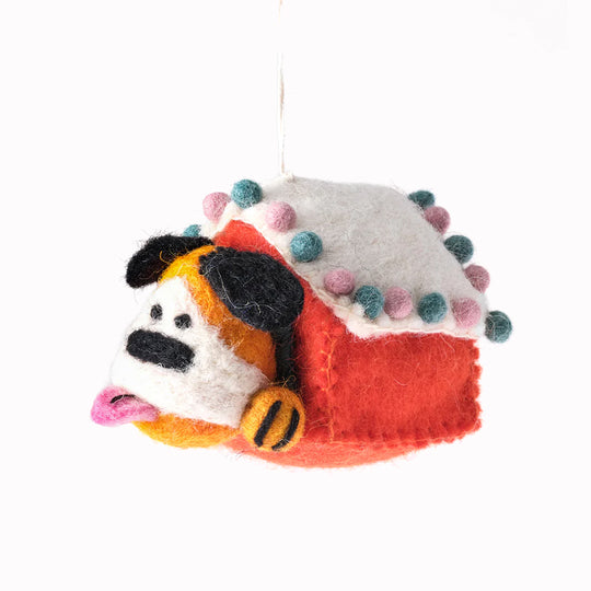 Roger the dog looking out from a Kennel. A playful felted Christmas tree decoration designed by Cari Vander Yacht.