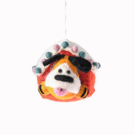 Roger the dog looking out from a Kennel. A playful felted Christmas tree decoration designed by Cari Vander Yacht.