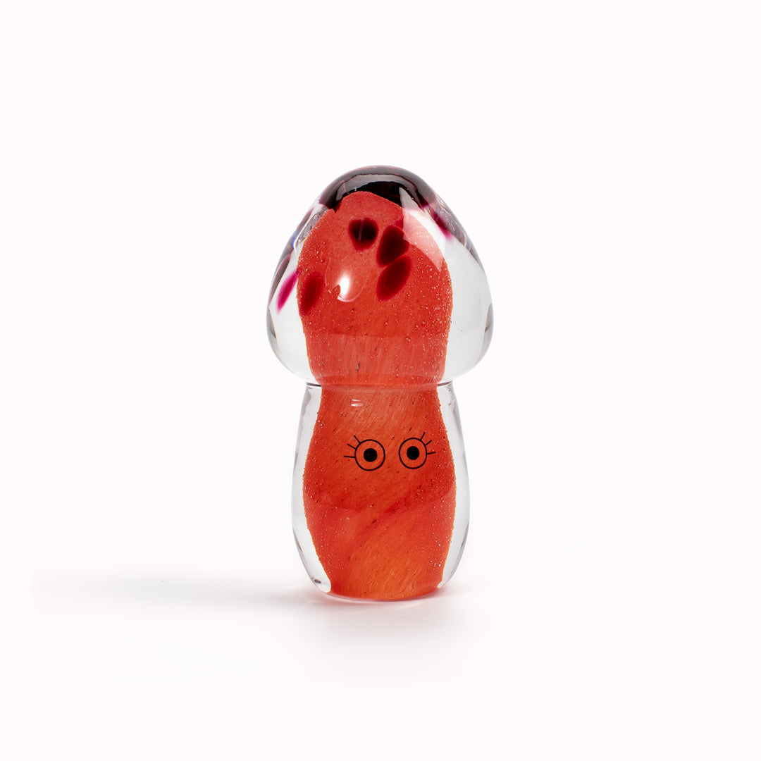 Shroom Crystal Blob is formed by dipping and/or rolling molten (hot!) clear glass into smaller chunks of brightly coloured glass droplets, then expertly shaping into weird and wonderful forms.