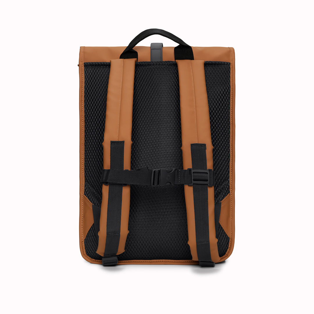 Rolltop Rucksack is Rains’ take on a cycling backpack. Made from Rains’ signature waterproof fabric, this functional backpack has a roll-top closure with an adjustable strap featuring a loop for a bike lock or similar.