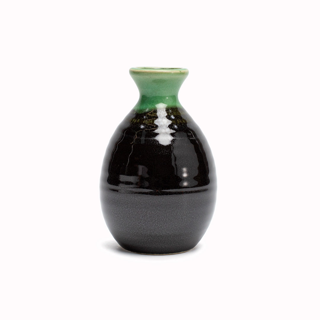 Japanese Sake jug featuring a distinctive black glaze with a bright green drip glaze, measures 13.5cm tall.