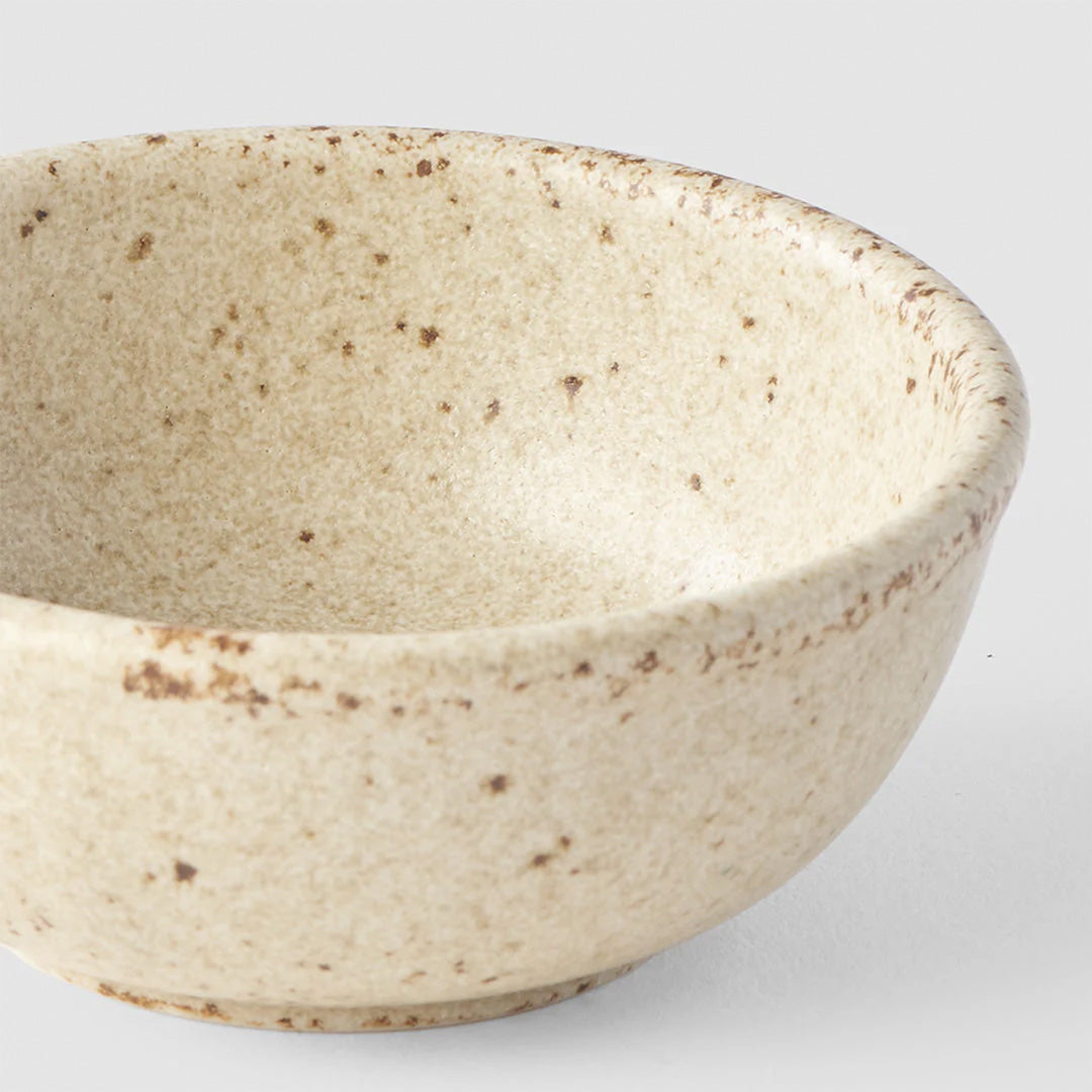 The Sand Fade Glaze features a warm, sandy tone with touches of hazel brown. Each piece has a unique dappled pattern determined by its position in the kiln during the firing process.