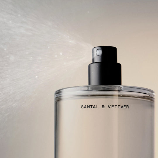 Santal &amp; Vetiver Body Mist is a warm, woody fragrance that transports you through twilight woods and crackling fires.
