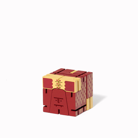The Cubebot Cryptoids Sasquatch is a wooden puzzle toy designed by David Weeks. This collectible item is constructed from durable beechwood and elastic