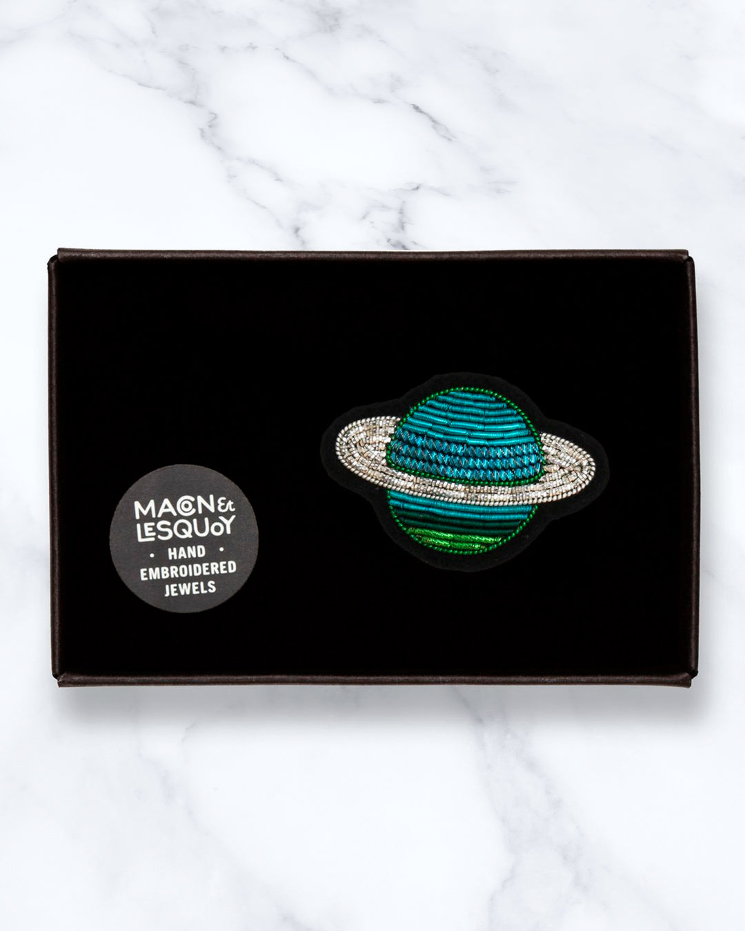Make a statement with this beautiful Saturn hand embroidered decorative lapel pin by Paris based Macon et Lesquoy - personalise your favourite garments to define your individual style.
