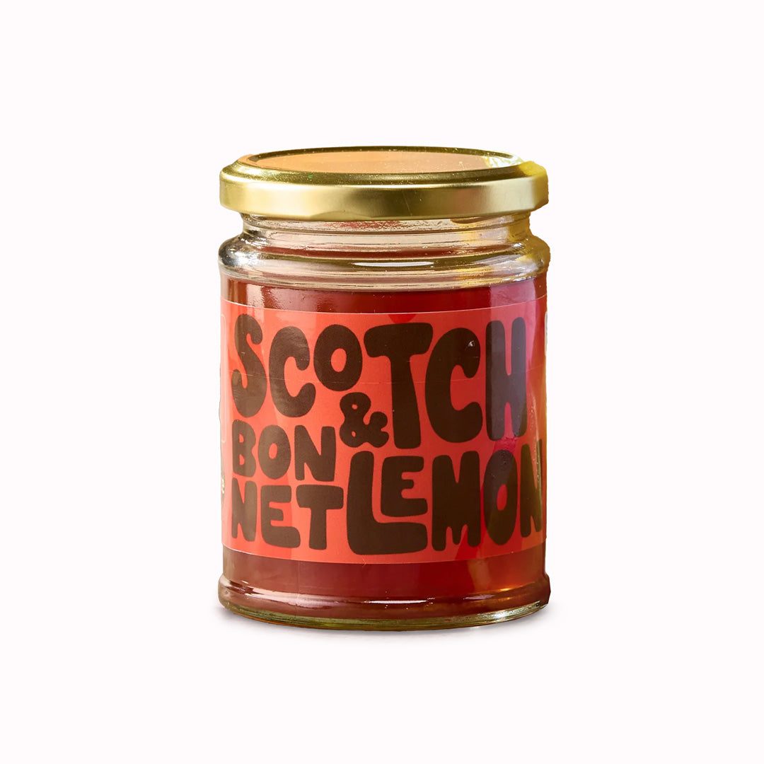 The Scotch Bonnet &amp; Lemon Pickling Liquid from Sylt Pickling is a fiery concoction that promises to ignite your taste buds with its blend of eye-watering chillies and refreshing lemon zest.