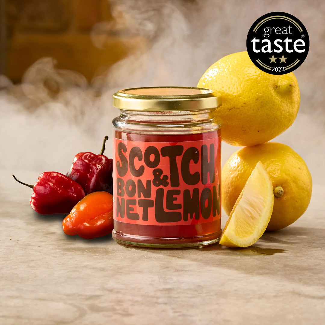 The Scotch Bonnet &amp; Lemon Pickling Liquid from Sylt Pickling is a fiery concoction that promises to ignite your taste buds with its blend of eye-watering chillies and refreshing lemon zest.