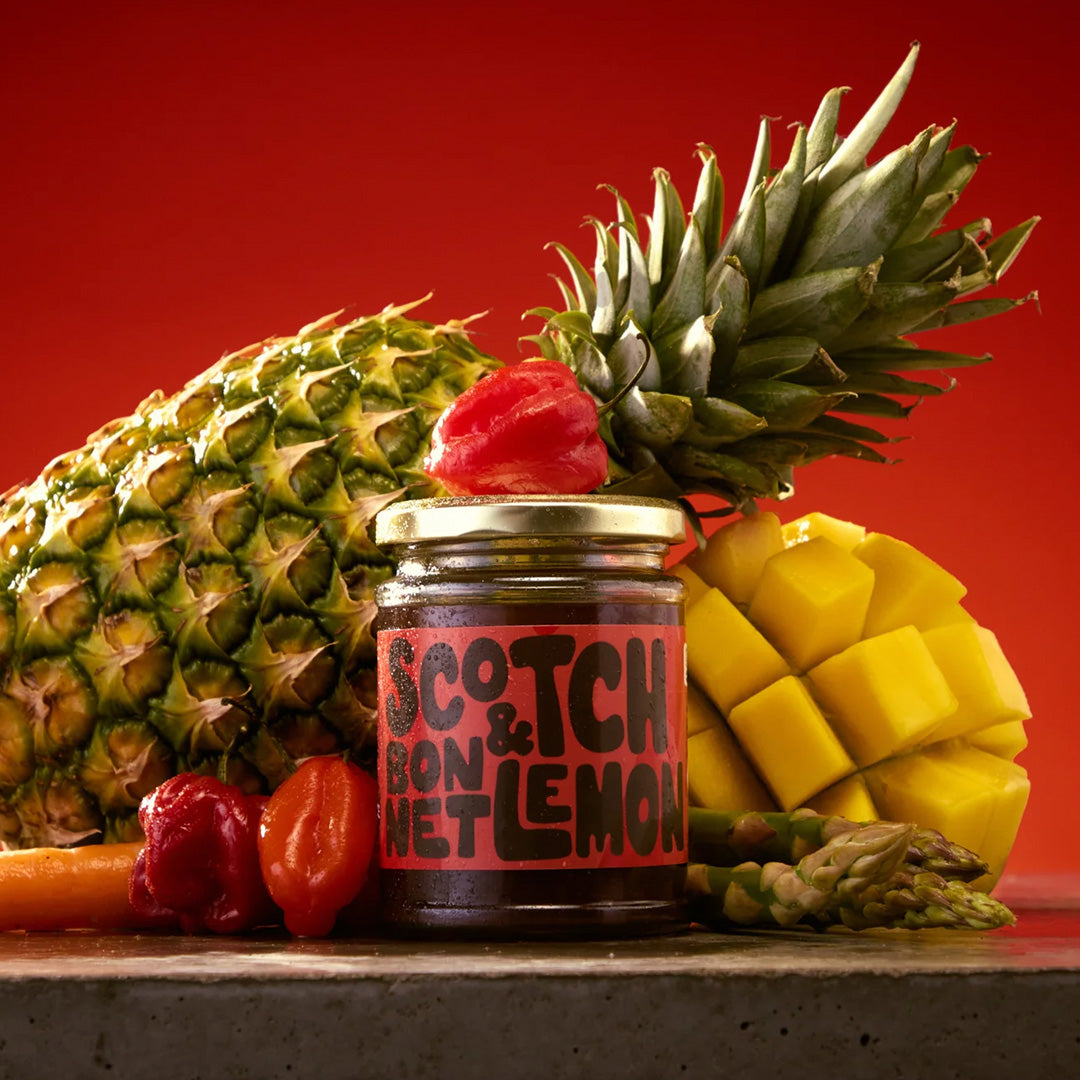 The Scotch Bonnet &amp; Lemon Pickling Liquid from Sylt Pickling is a fiery concoction that promises to ignite your taste buds with its blend of eye-watering chillies and refreshing lemon zest.