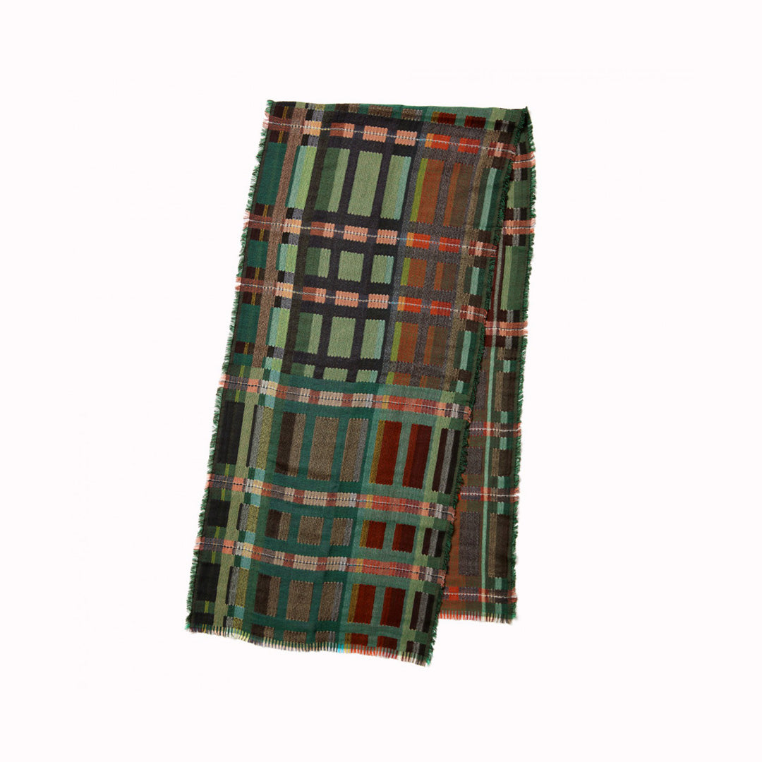 The Sedge Pasture lambswool scarf by Wallace and Sewell showcases the intricate craft of textile design, blending traditional techniques with modern aesthetics.