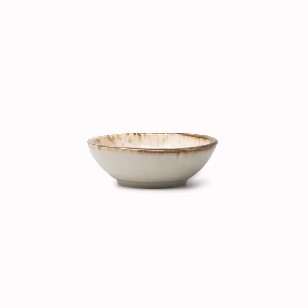 A warm creamy toned shallow bowl perfect for dips and sauces, gently flared with warm toasted rim and a natural speckle
