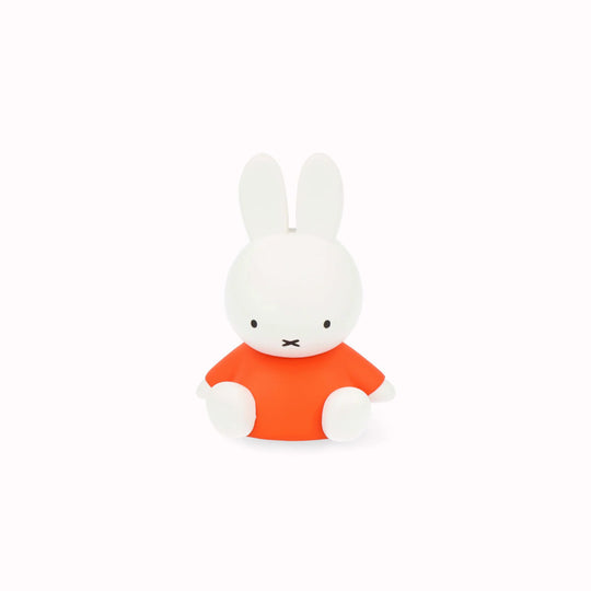 In orange and white vinyl, approximately 9cm tall, Sitting Miffy from Series 4