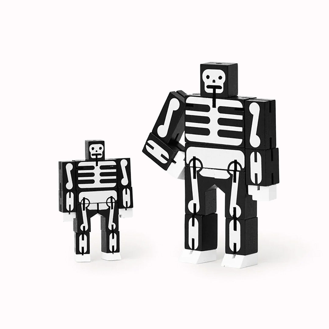 Cubebot is a fun wooden toy robot that folds out of a perfect cube shape. Part puzzle, part posable toy they are inspired by Japanese Shinto Kumi-ki puzzles and can be positioned to hold dozens of poses