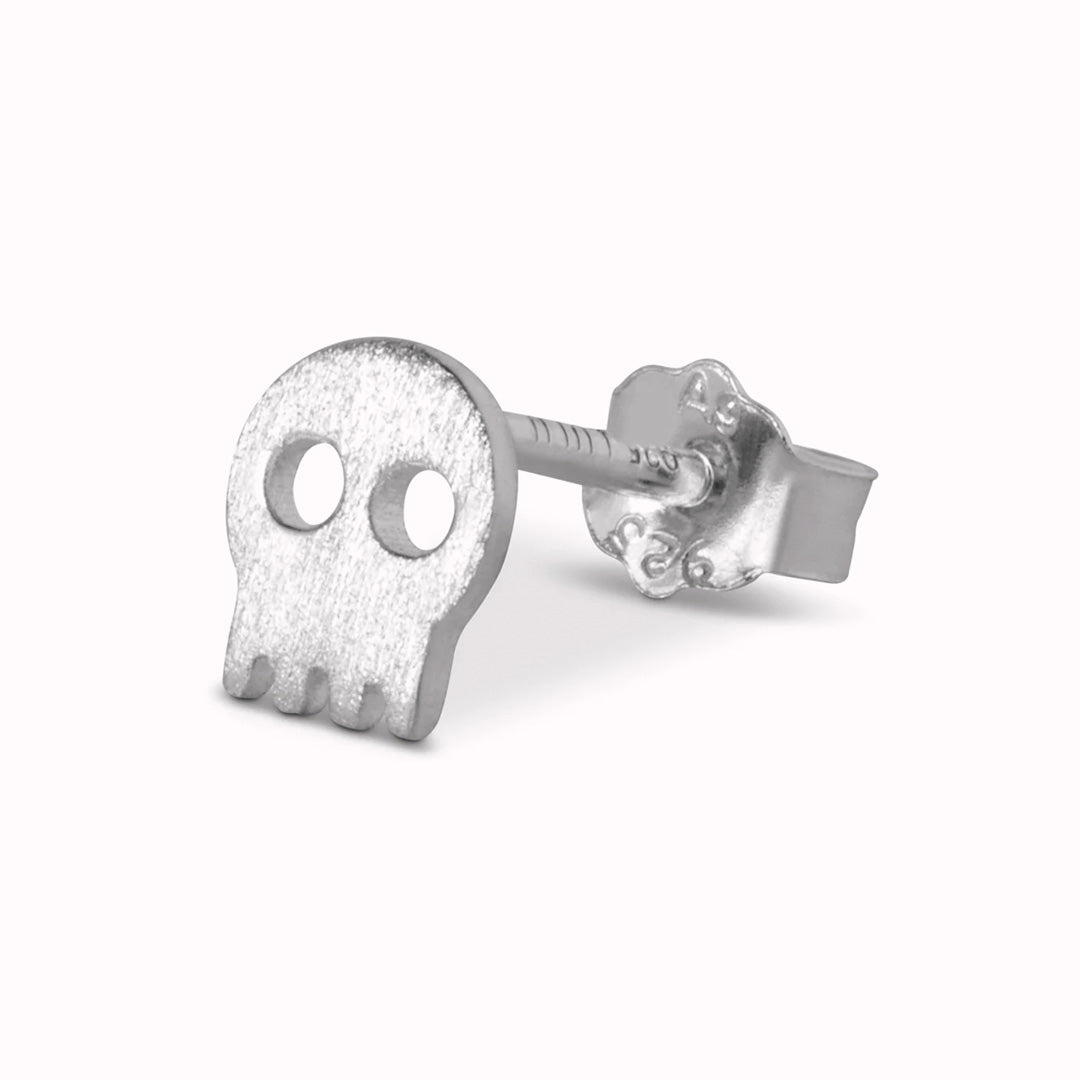 Skully is a playful take on a punkish look. This cute little wonder (sold individually) will be a final touch in your personal earring mix and match.