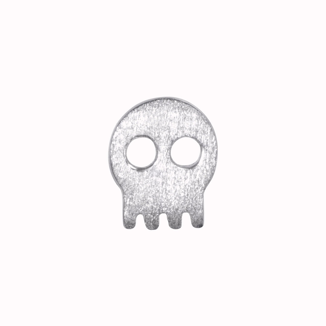 Skully is a playful take on a punkish look. This cute little wonder (sold individually) will be a final touch in your personal earring mix and match.