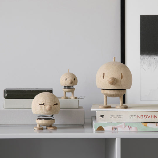 Collection - Playfully designed small Hoptimist in oak from the Danish designers Hoptimist. Most smiles are triggered by another smile
