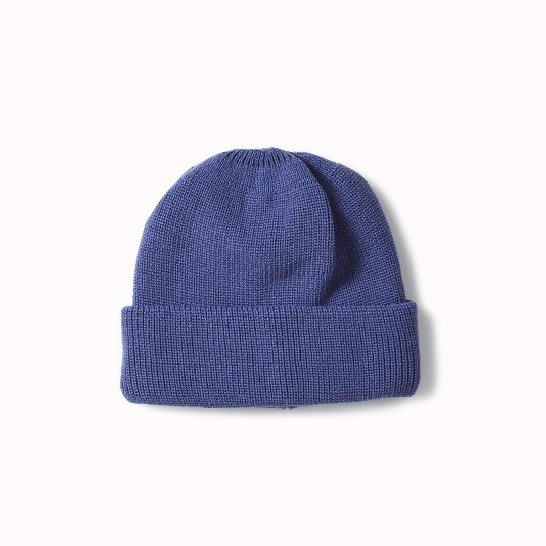 The Rototo Bulky Watch Cap is a stylish and practical accessory, perfect for those seeking both warmth and fashion. Made in Japan, this cap is crafted from a blend of 80% acrylic, 15% nylon, and 5% wool