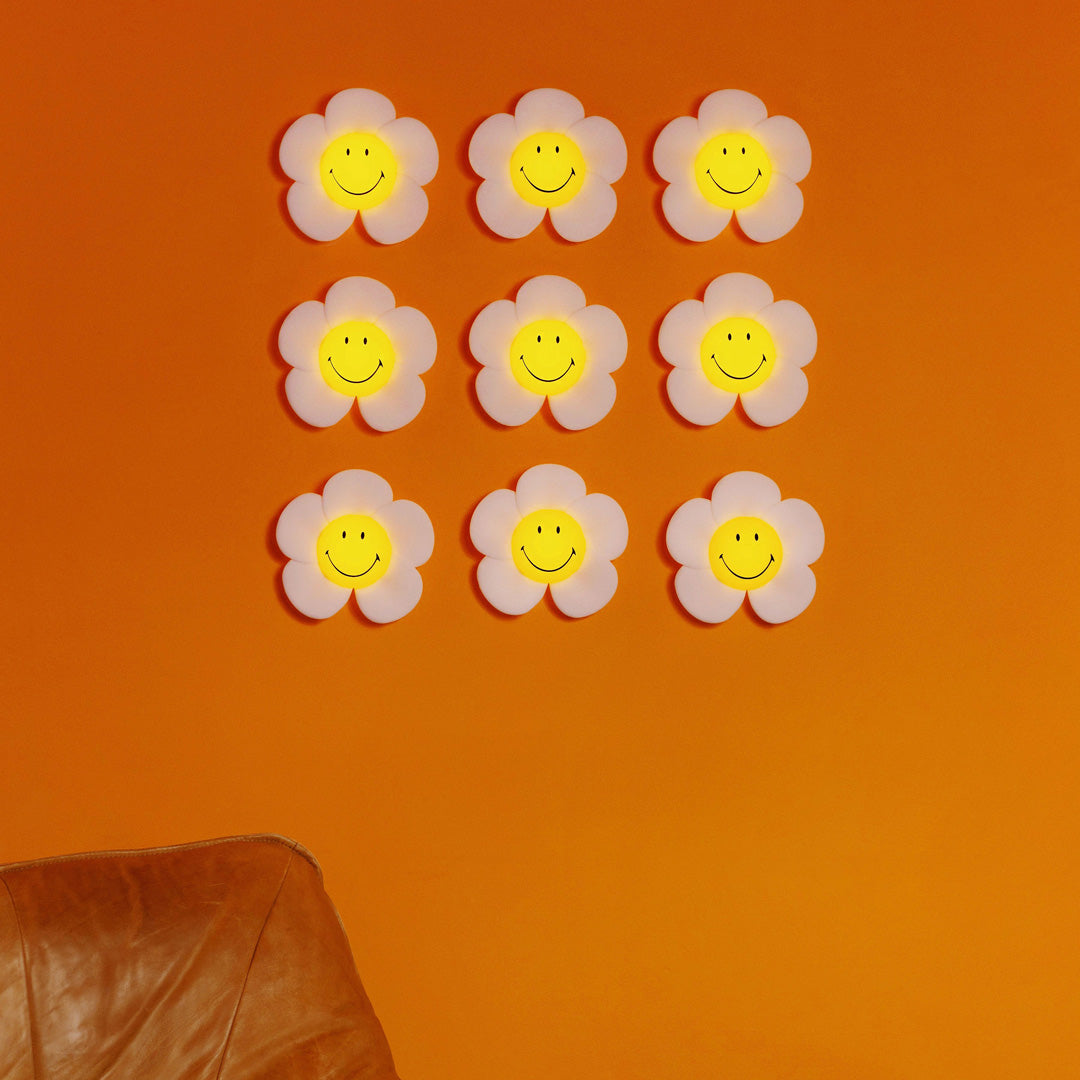 The Mr Maria Smiley Daisy lamp is a delightful addition to any room, offering not just illumination but also a touch of timeless joy with the Smiley brand - Lifestyle