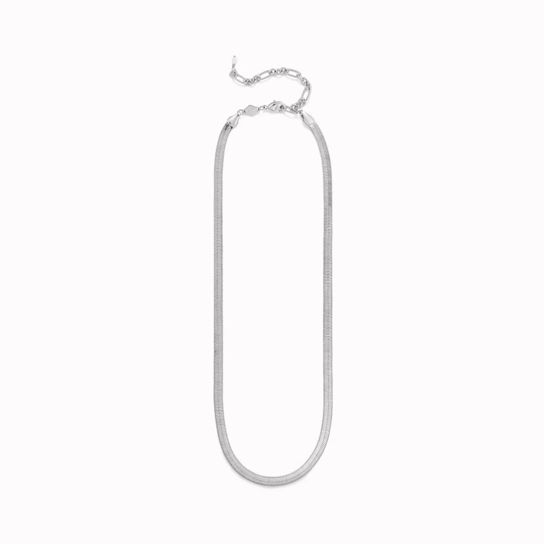 A neat, fluid chain with a slightly sculptural feel, the Snake Charmer Necklace sits cleanly along the collarbone and moves naturally with the wearer.