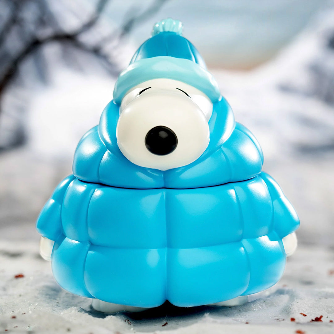 inspired by Charles Schulz’s classic comic strip, showcases Snoopy in his iconic, oversized puffy coat