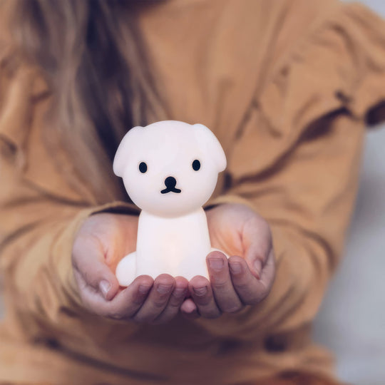 The Snuffy Bundle of Light Nightlight is made of soft silicone and gives a peaceful and subtle light.

This little friend with a gentle smile will keep a close eye when bedtime comes.