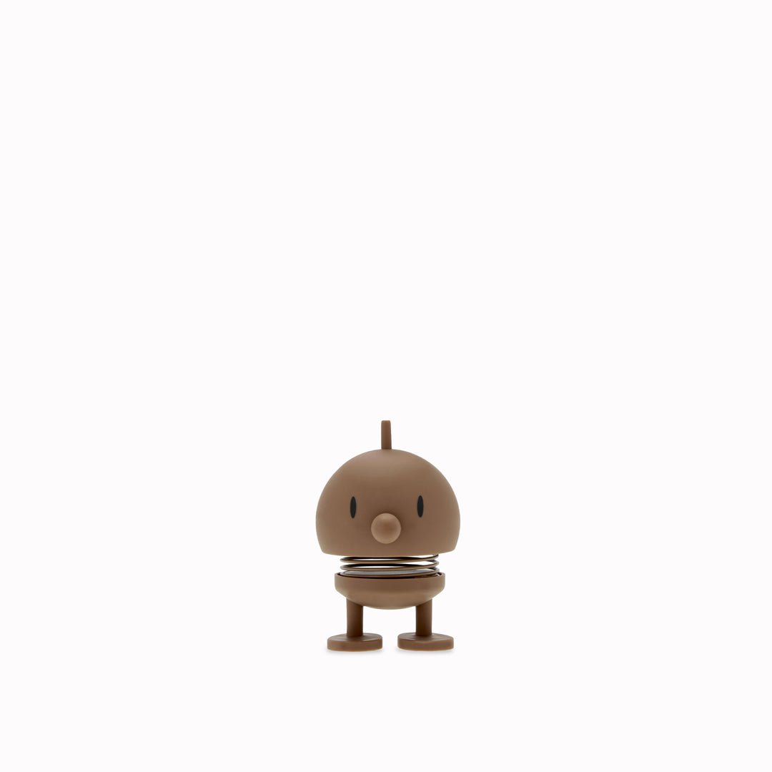 Bumble, the classic Hoptimist creation has a happy face and bouncy wobbly head which brings the little figurine to life and works as a symbol of positive optimism and good humour
