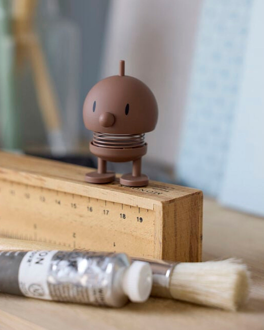 Bumble, the classic Hoptimist creation has a happy face and bouncy wobbly head which brings the little figurine to life and works as a symbol of positive optimism and good humour