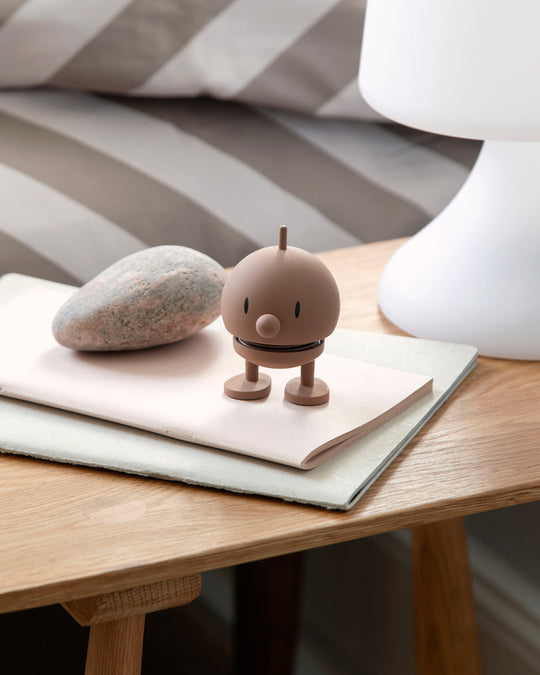 Springy and cheerful! Bumble by Hoptimist is the classic 1960's home decor, happy ornamental figurine in an interior friendly soft brown colour tone.&nbsp;