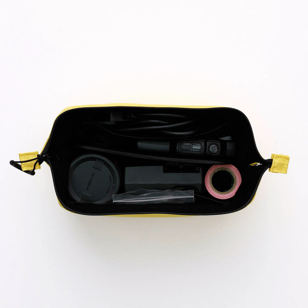 A highly versatile large soft carry case from Hightide Nahe, Japan. The polyester pouch is suitable for storing small tech, cables and more