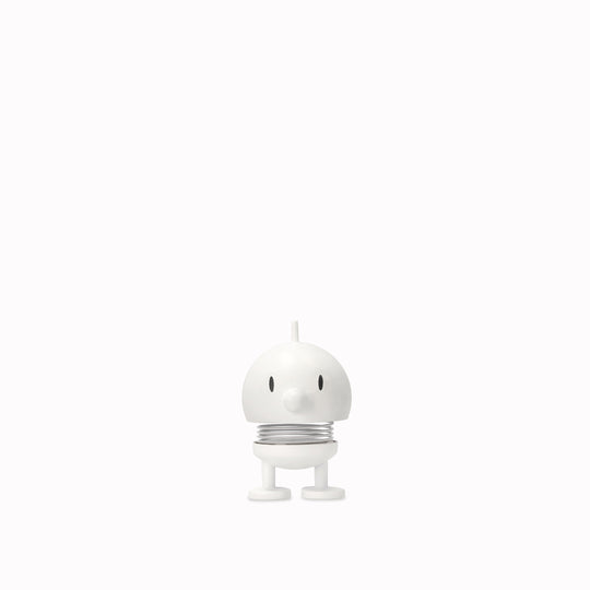 Bumble, the classic Hoptimist creation has a happy face and bouncy wobbly head which brings the little figurine to life and works as a symbol of positive optimism and good humour