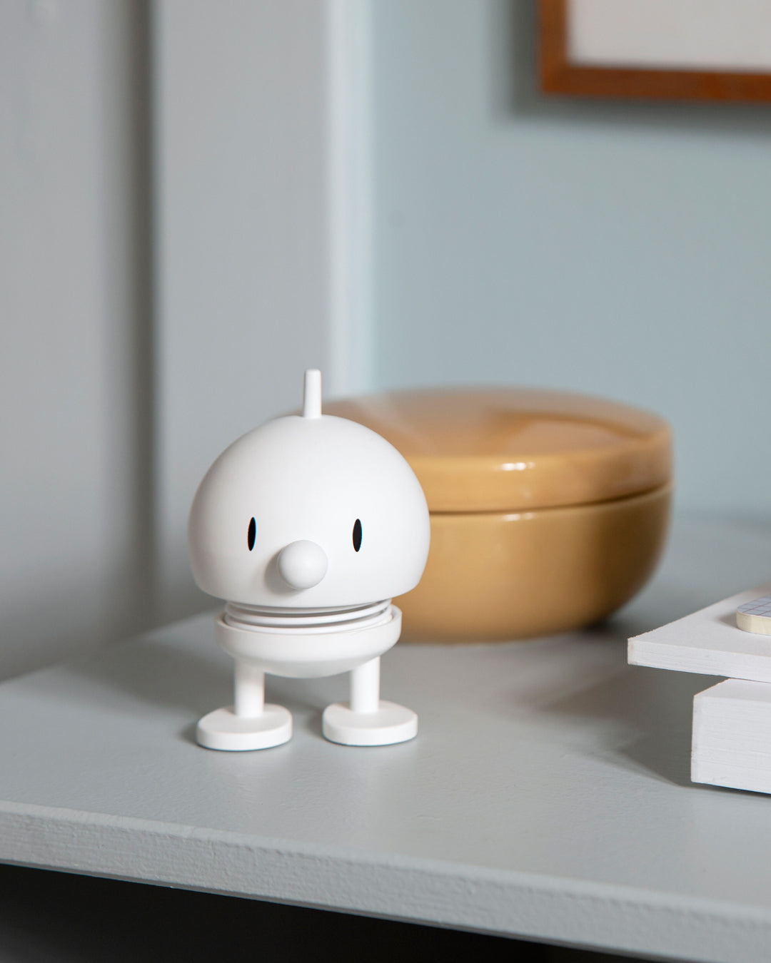 Springy and cheerful! Bumble by Hoptimist is the classic 1960's home decor, happy ornamental figurine in a mimimalist soft white.