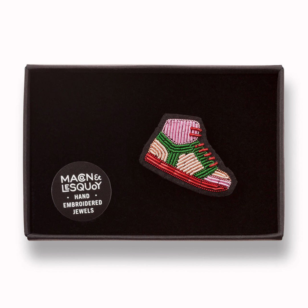 Sport Shoe is a hand embroidered decorative brooch from the Macon et Lesquoy summer 2024 collection, inspired by the 2024 Paris Olympics. An iconic sneaker style always in fashion - In Box.