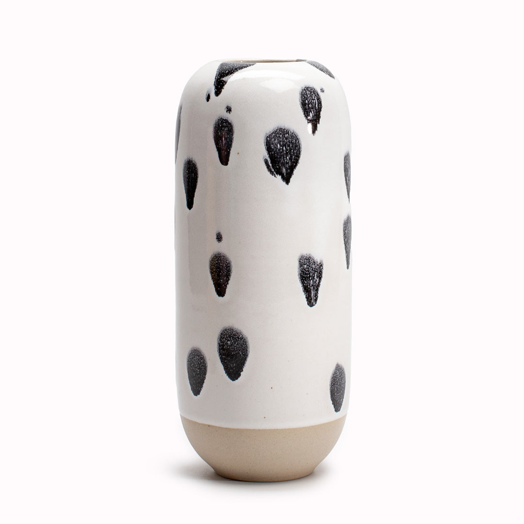 Studio Arhoj's Japanese inspired vases are named after the Japanese word for snow. The Black and White Spot design is hand-thrown in watertight stoneware.