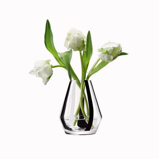 A bold and graphic black and white striped glass vase by LSA International. With hand applied stripes, each piece has slight variations which add to the artisan appeal of these mouth blown glass vases.