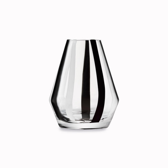 A bold and graphic black and white striped glass vase by LSA International. With hand applied stripes, each piece has slight variations which add to the artisan appeal of these mouth blown glass vases.