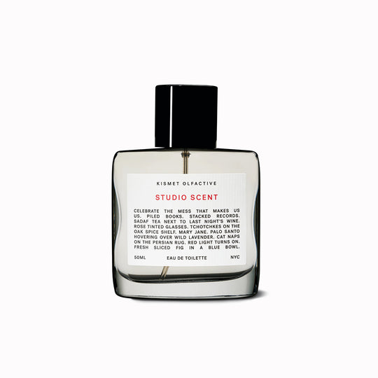 Perfume bottle labeled 'Studio Scent' by Kismet Olfactive on a white background