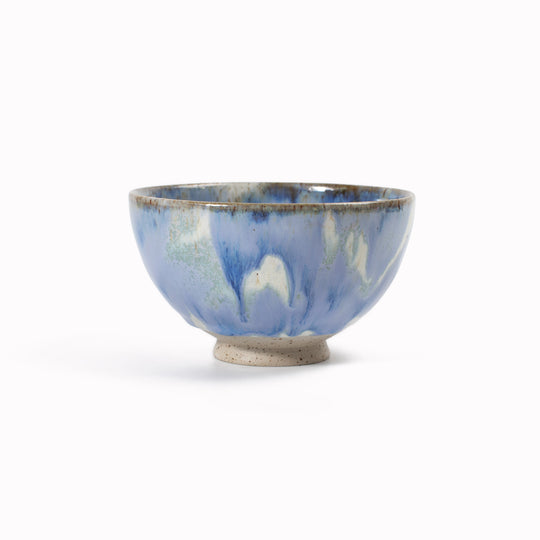 The Sun Bowl by Studio Arhoj is a low, open stoneware bowl designed for serving and shared dining. Part of the Edo Series, it reflects the studio’s focus on expressive ceramics where bold glaze work meets simple, functional forms.