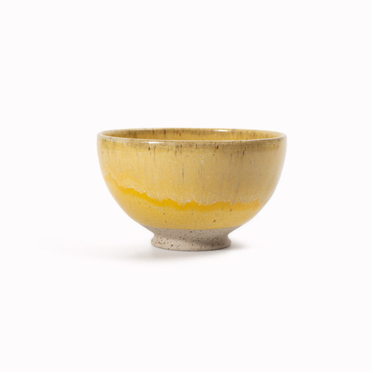 The Sun Bowl by Studio Arhoj is a low, open stoneware bowl designed for serving and shared dining. Part of the Edo Series, it reflects the studio’s focus on expressive ceramics where bold glaze work meets simple, functional forms.