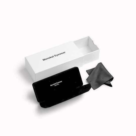 Monokel Box and Pouch for SunglassesHavana - Clean lines meet understated sophistication. The sharp rectangular frames are crafted by hand from organic and biodegradable acetate. As Worn.