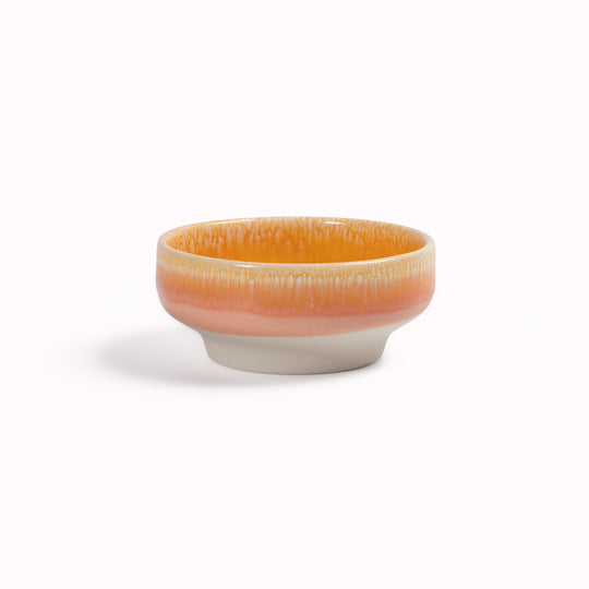 Studio Arhoj's Sunset Dip Dish is a beautifully handcrafted piece of porcelain and is part of the Tokyo tableware series.