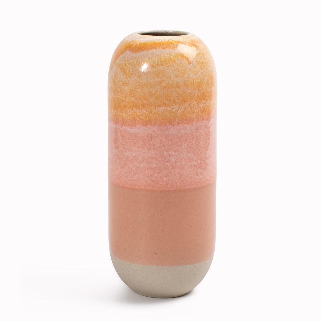 Studio Arhoj's Japanese inspired vases are named after the Japanese word for snow. The pink over peach hued 'Sunset' design is hand-thrown in watertight stoneware, with colour blocked pink toned shades mimicking the evening sunset.&nbsp;