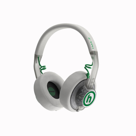 AIAIAI x HIDDEN.NY Ltd Ed White headphones with green accents on a white background