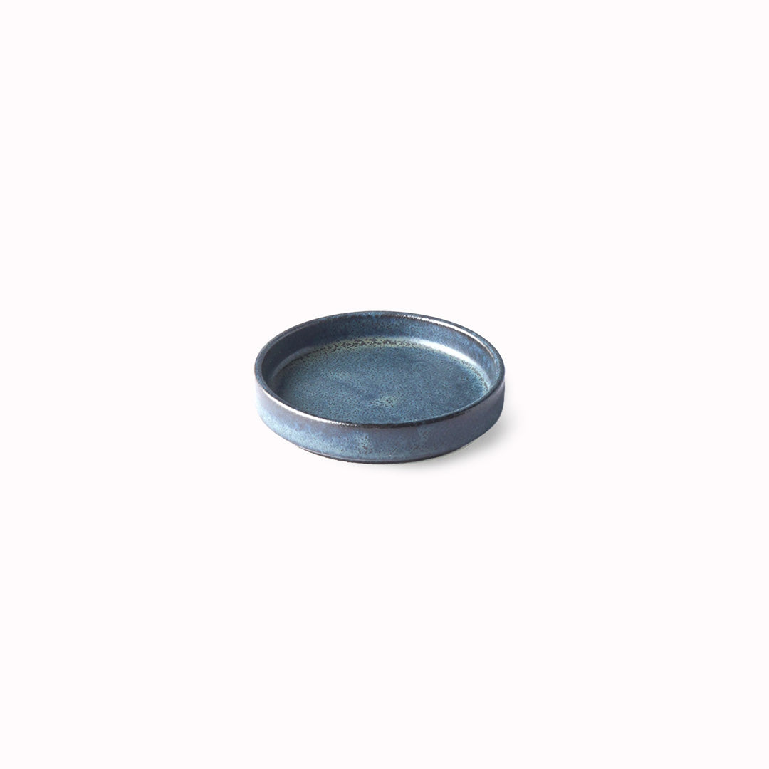 The Ibushi Table Sauce Dish from Made in Japan, approximately 8cm wide in a black glaze - perfect for dipping sauces.