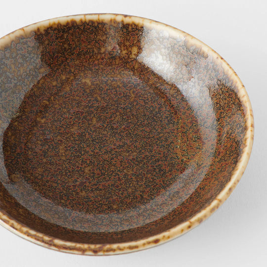 The Mocha Glaze features a a speckled glaze with dark chocolate tones. Each piece has a unique dappled pattern determined by its position in the kiln during the firing process.