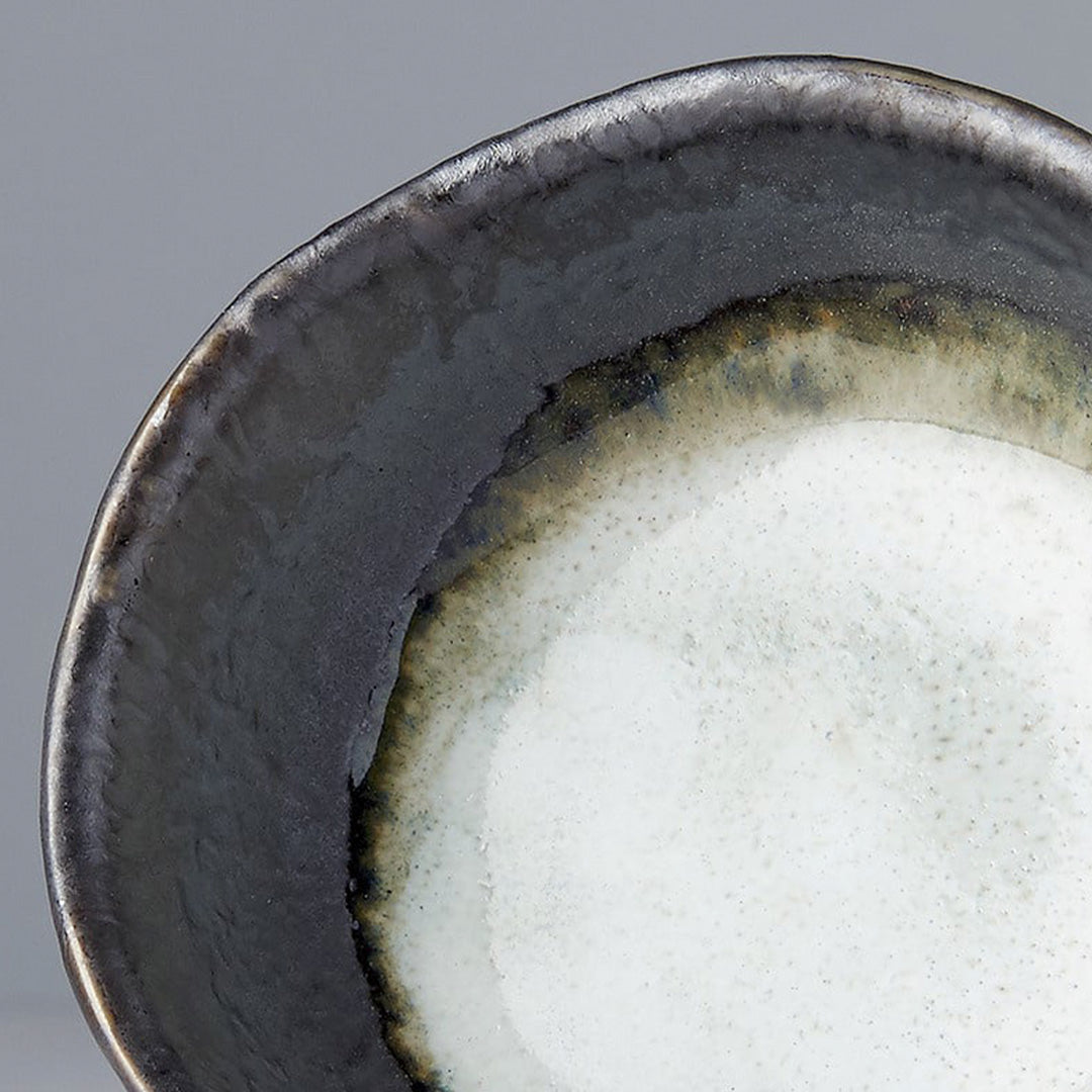 Table Sauce Dish from Made in Japan, approximately 8cm wide in a two tone grey rustic looking glaze - perfect for dipping sauces.