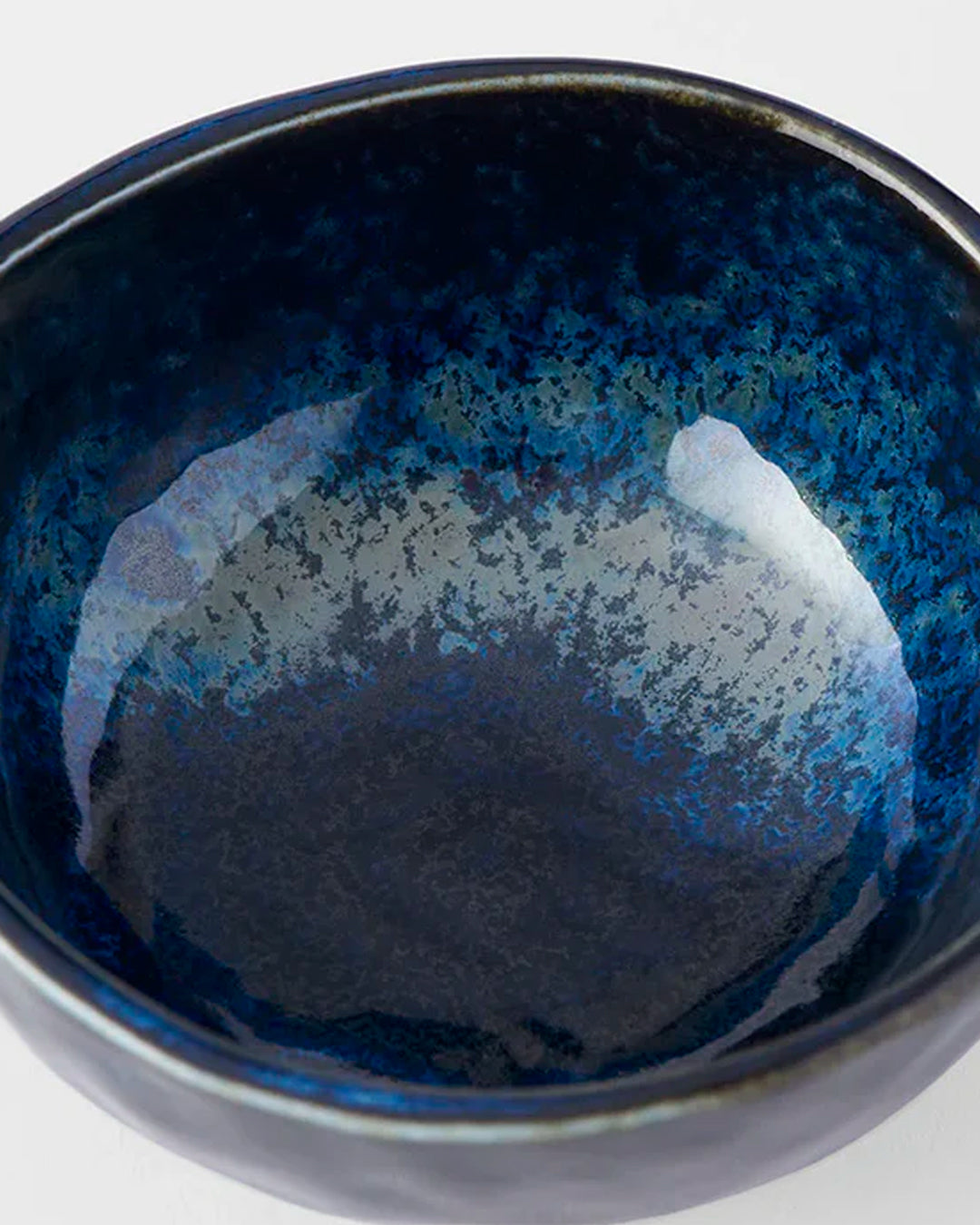 Inigo Blue Glaze Table Sauce Dish from Made in Japan, approximately 8.5cm with an irregular, organic shaping to the edge. Designed for soy sauce, dips or small condiments such as picked ginger.