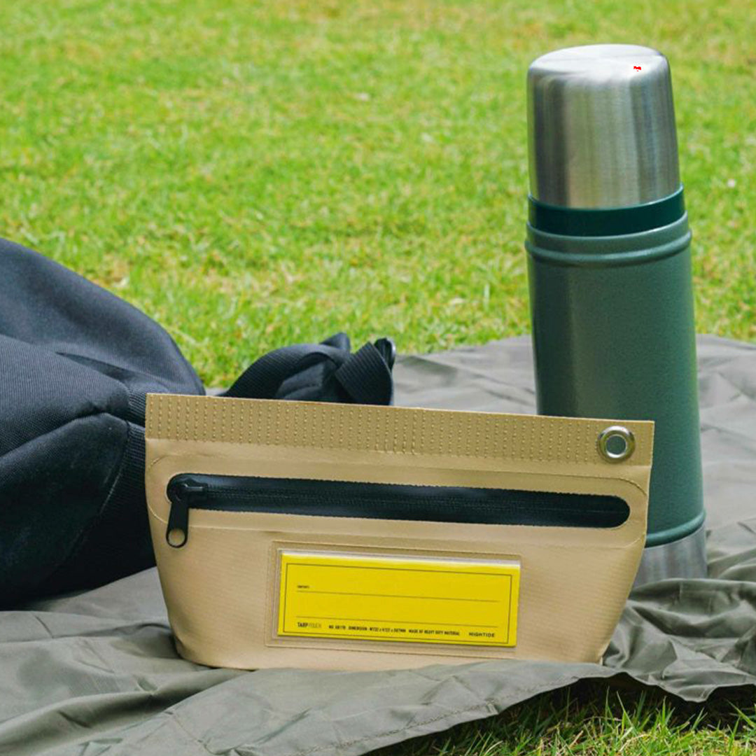 Tarp Pouch from Hightide Penco is a versatile and waterproof pouch made from tarpaulin style PVC fabric. 