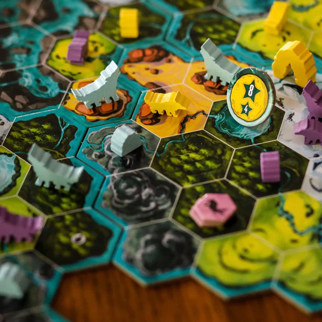 The Wolves is a pack-building strategy game for 2-5 players. It’s survival of the fittest as you compete to build the largest, most dominant pack by claiming territory, recruiting lone wolves, and hunting prey. Detail of board