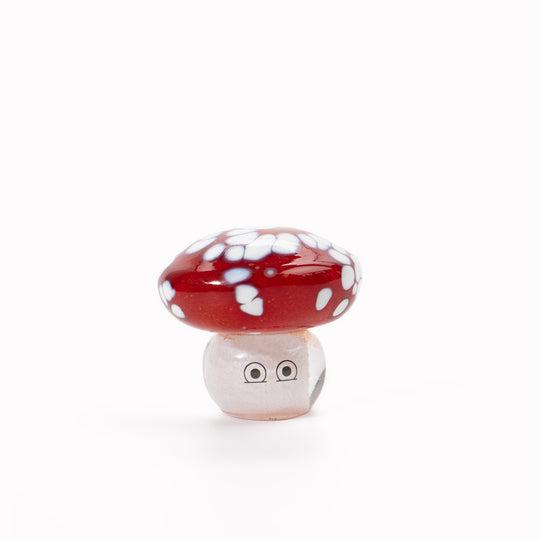 Shroom Crystal Blob is formed by dipping and/or rolling molten (hot!) clear glass into smaller chunks of brightly coloured glass droplets, then expertly shaping into weird and wonderful forms.